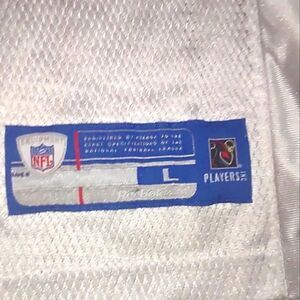 Manning # 18 Reebok man blue n white jersey size Large